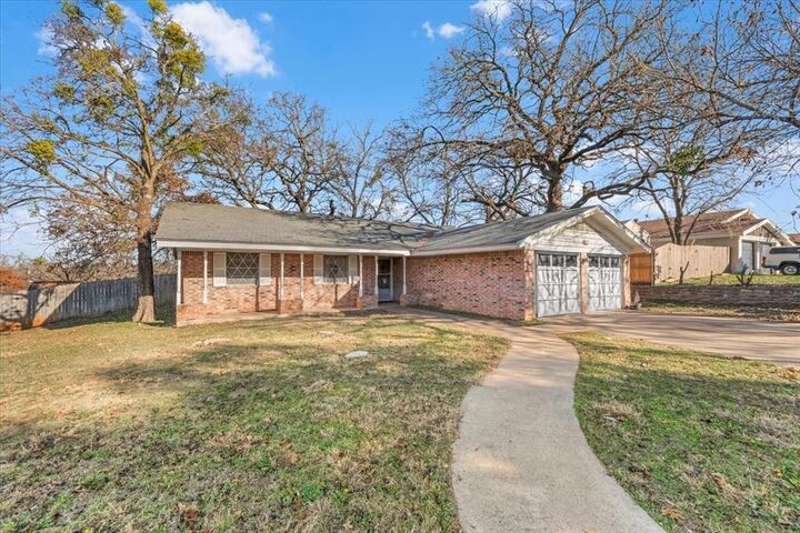 Property Photo:  601 State Street  TX 76086 