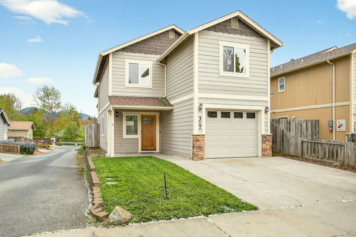 Property Photo:  317 SW Bayou Place  OR 97526 