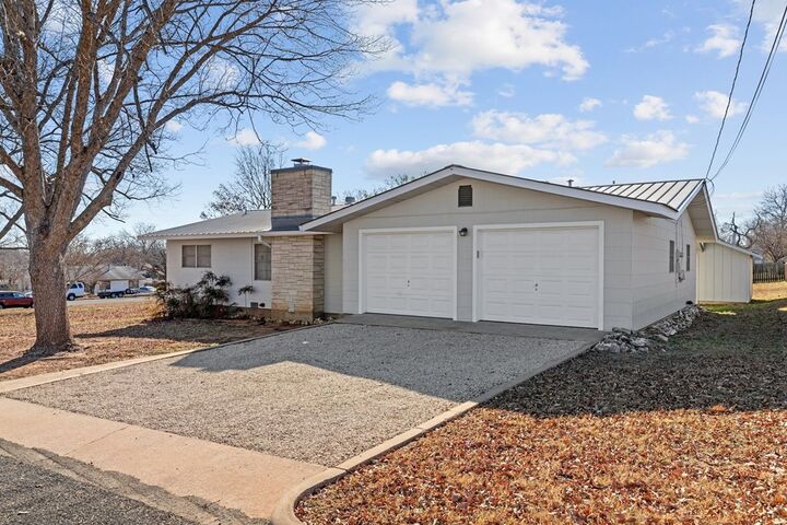 Property Photo:  303 Walnut St  TX 78624 