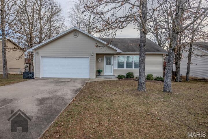 Property Photo:  1402 Raspberry Drive  MO 65536 