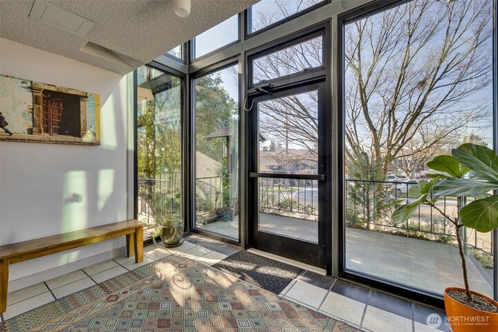 Property Photo:  6110  24th Avenue NW 203  WA 98107 