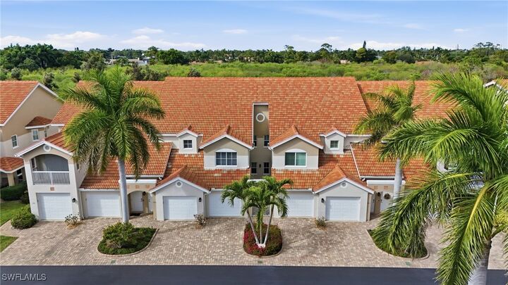 Property Photo:  28630 Carriage Home Drive 103  FL 34134 