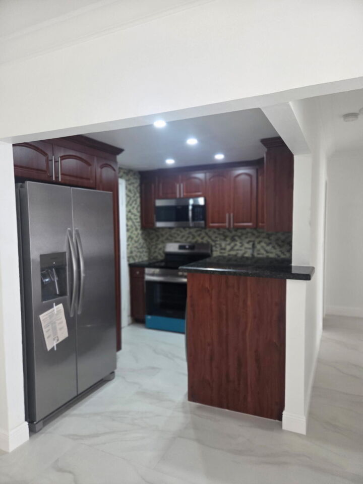 Property Photo:  2161 NE 68th Street 303  FL 33308 