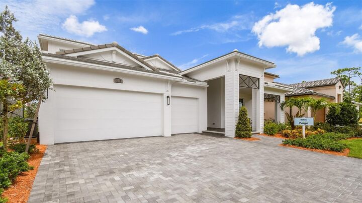 Property Photo: 13662 SE Grovewood Drive FL 34984