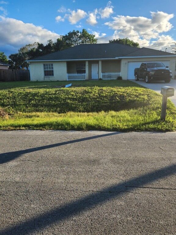 Property Photo:  1470 SW Sudder Avenue  FL 34953 