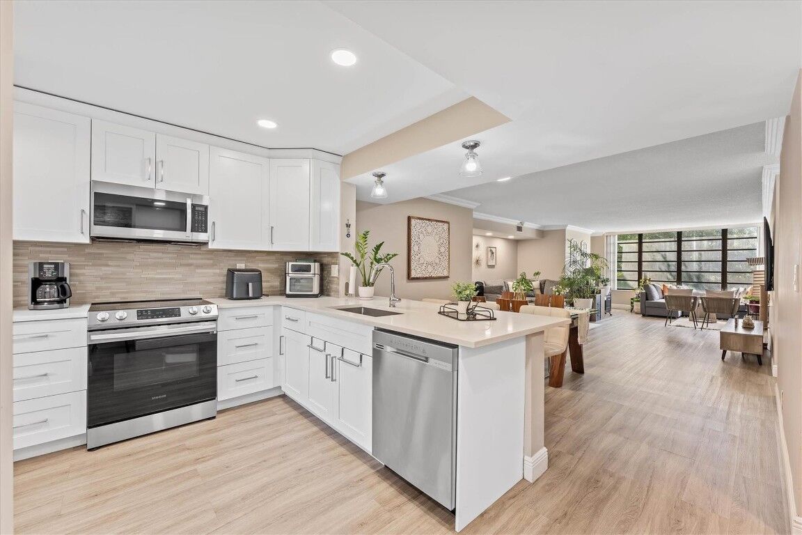 Property Photo:  4132 S Carambola Circle F206  FL 33066 