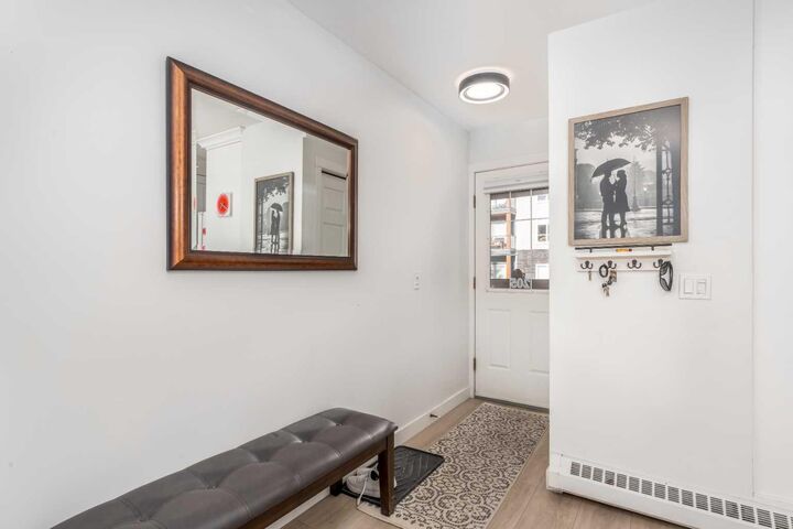 Property Photo:  112 Kananaskis Way 205  AB T1W 2X2 