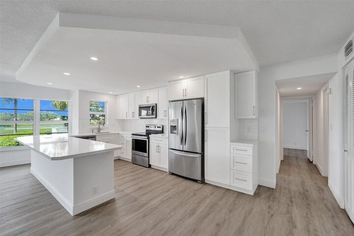 Property Photo:  2500 NE 48th Lane 103  FL 33308 