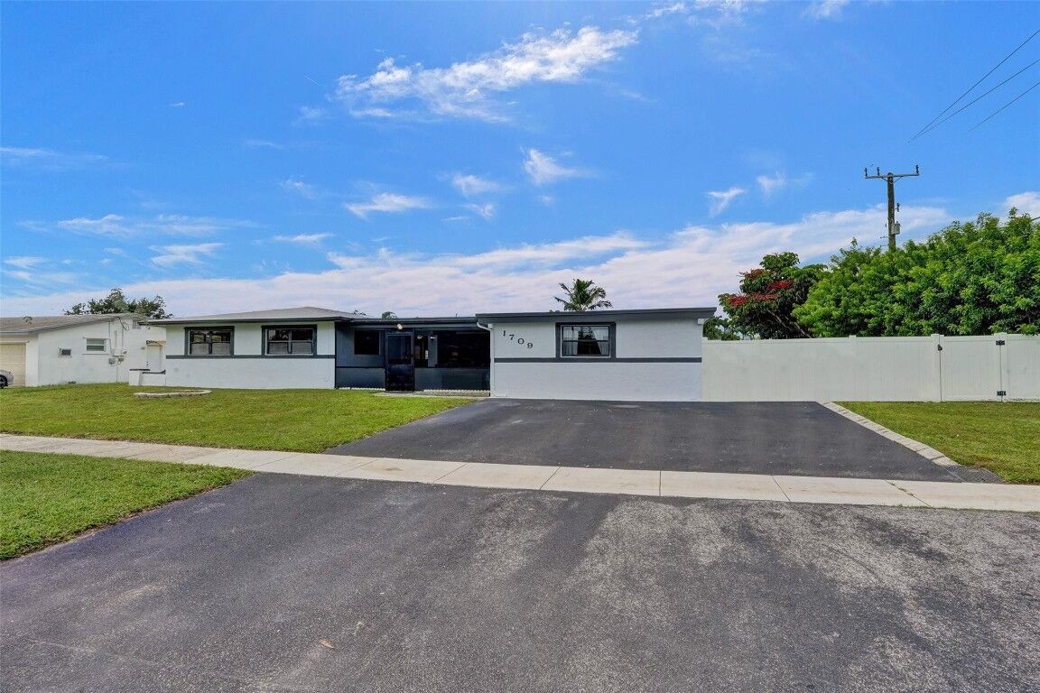 Property Photo:  1709 E River Drive  FL 33063 