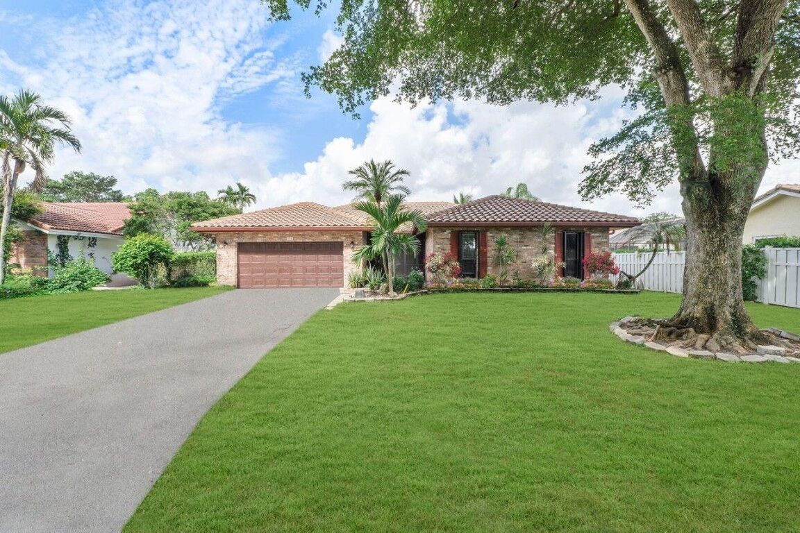 Property Photo:  3934 NW 70th Avenue  FL 33065 