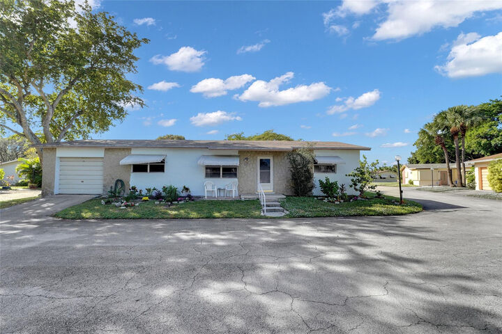Property Photo:  2617 SW Natura Avenue  FL 33441 
