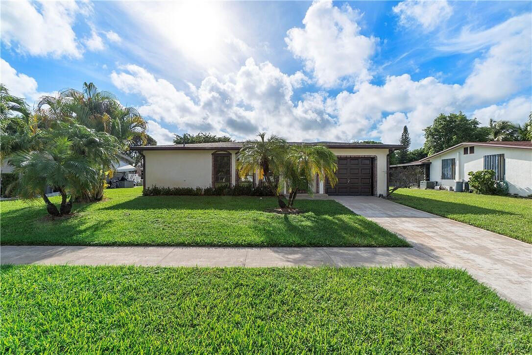 Property Photo:  14656 Sunny Waters Lane  FL 33484 
