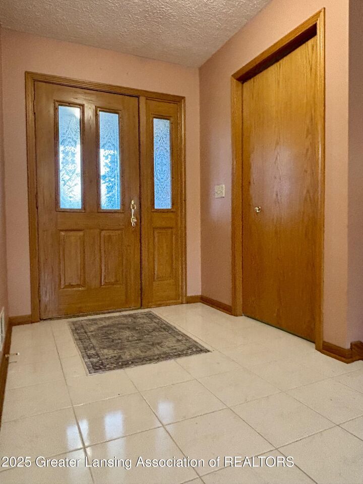 Property Photo:  5091 Runnymede Drive  MI 48842 