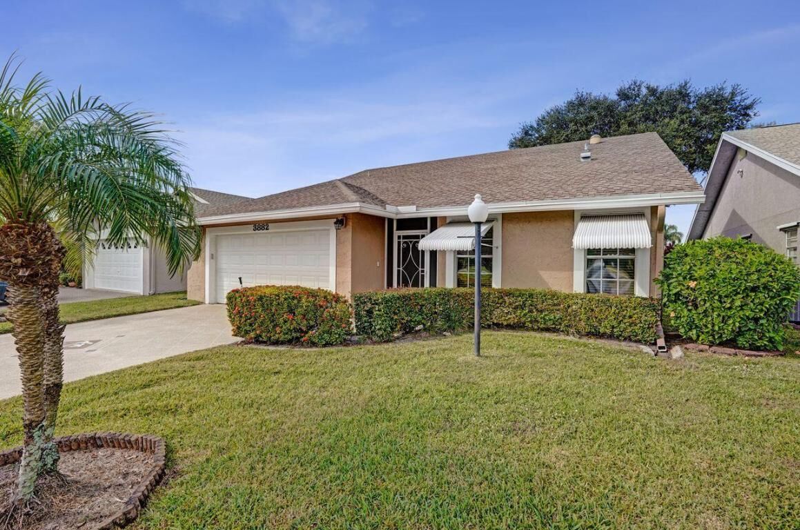 Property Photo:  3882 Dafilee Circle  FL 33417 
