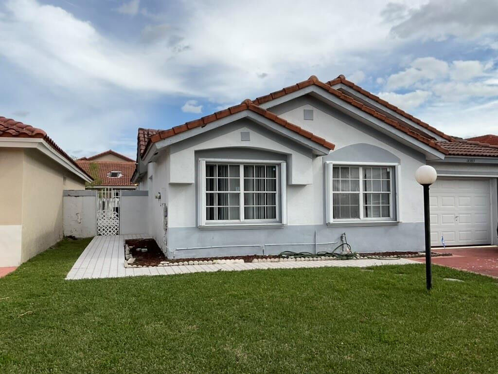 Property Photo: 18965 NW 54th Avenue FL 33055