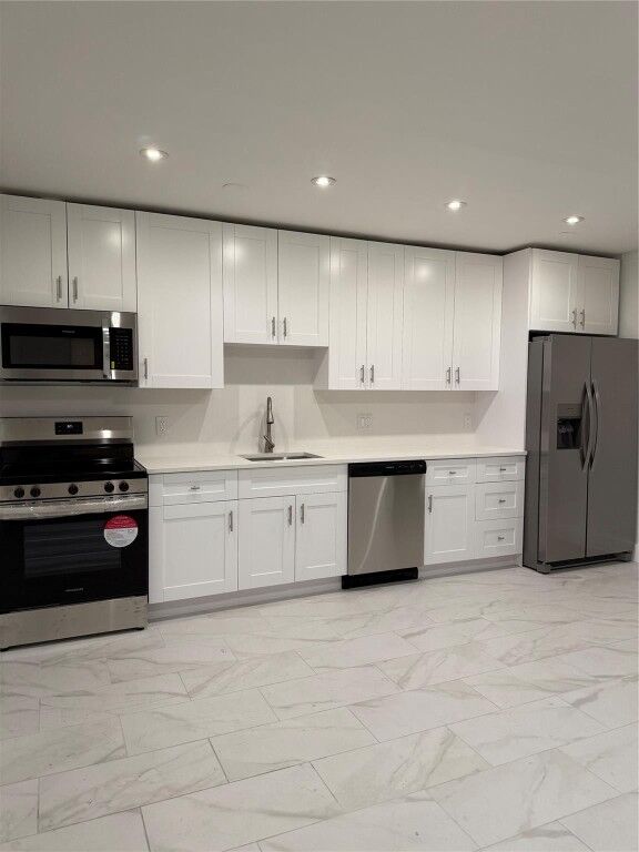 Property Photo:  1851 NE 62nd Street 502  FL 33308 