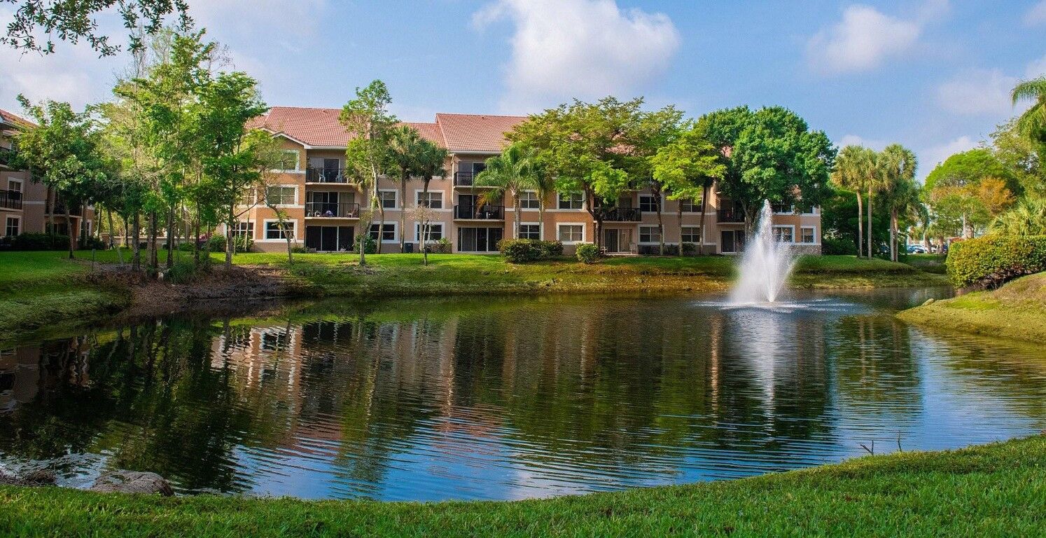 Property Photo:  8977 Wiles Road 2-203  FL 33066 