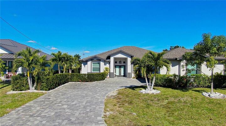 Property Photo:  223 SE 17th St  FL 33990 