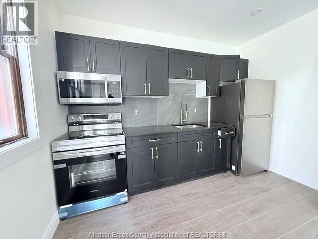 Property Photo: 691 Ouellette Avenue 4 ON N9A 4J4