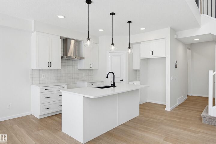 Property Photo: 2535 211 Street NW AB T6M 3H1