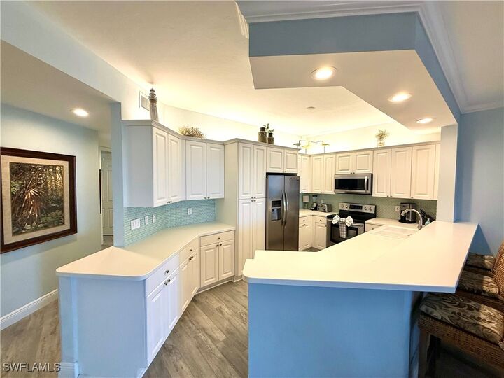 Property Photo: 410 Flagship Drive 305 FL 34108