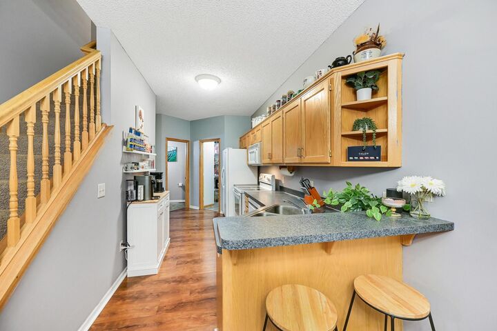 Property Photo:  5435 144th Way NW 14  MN 55303 