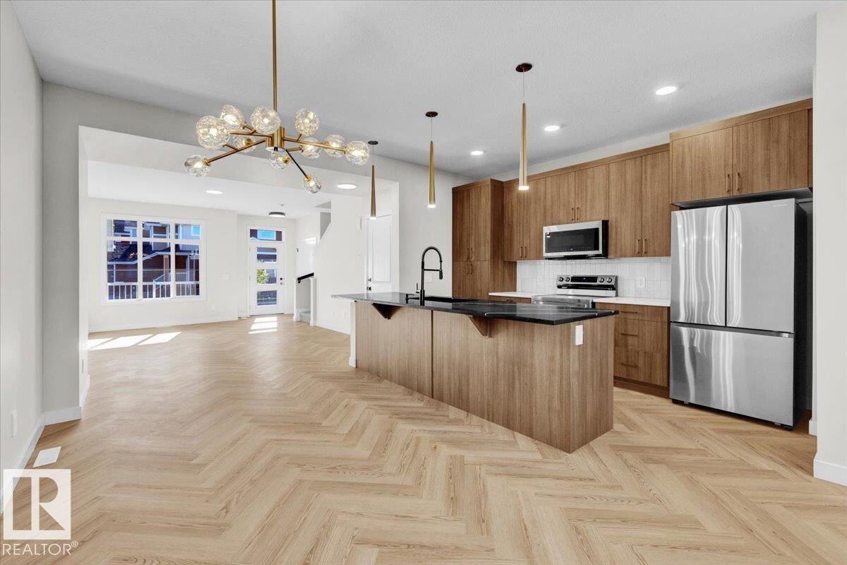 Property Photo:  1316 Keswick Drive SW  AB T6W 4V8 