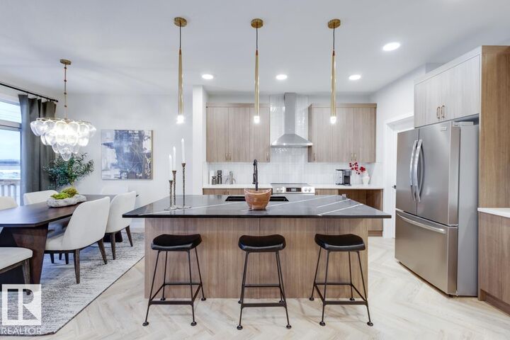 Property Photo:  4136 208 Street NW  AB T6M 3E4 