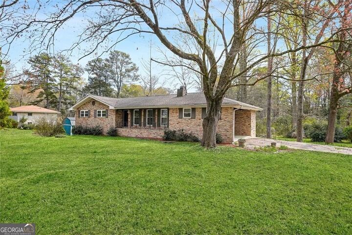 Property Photo:  6428 Melrose Drive  GA 30134 