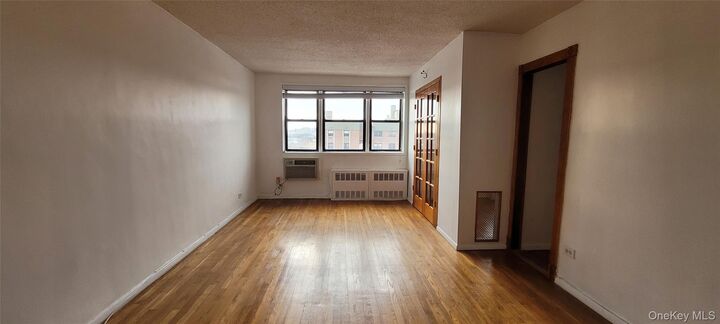 Property Photo:  84-20 153rd Avenue 6H  NY 11414 
