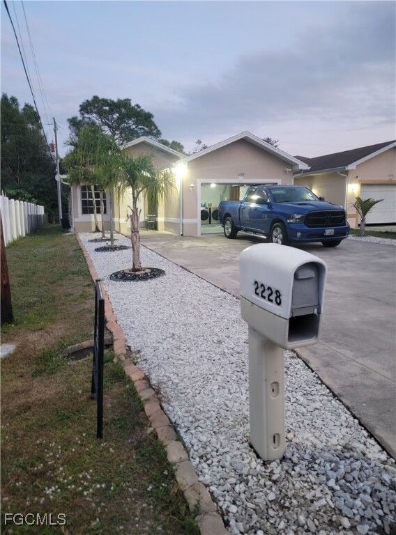 Property Photo:  2228 Lotus Road  FL 33905 