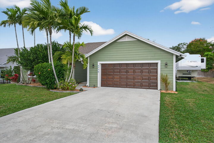 Property Photo:  9275 SE Mercury Street  FL 33455 