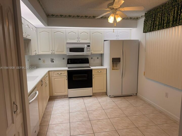Property Photo:  801 SW 138th Ave 106E  FL 33027 