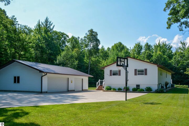 Property Photo:  6622 Walton Road  MI 49649 