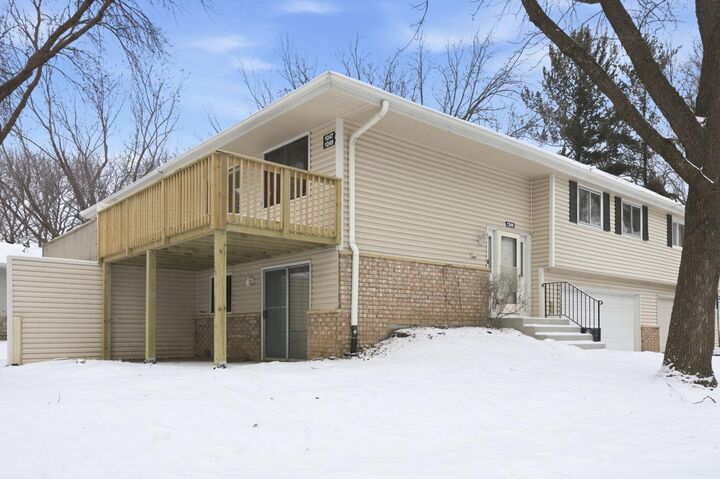 Property Photo:  1249 Timbershore Lane 407  MN 55123 