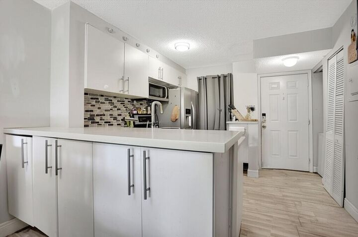 Property Photo:  2216 N Cypress Bend Drive 501  FL 33069 