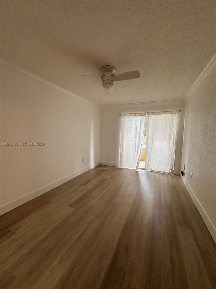 Property Photo:  10795 SW 108th Ave 304  FL 33176 