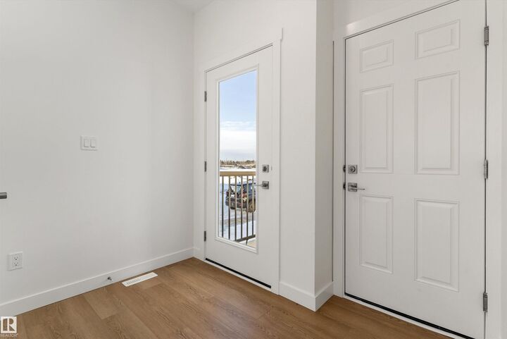 Property Photo:  17317 6A Street NE  AB T5Y 4E8 