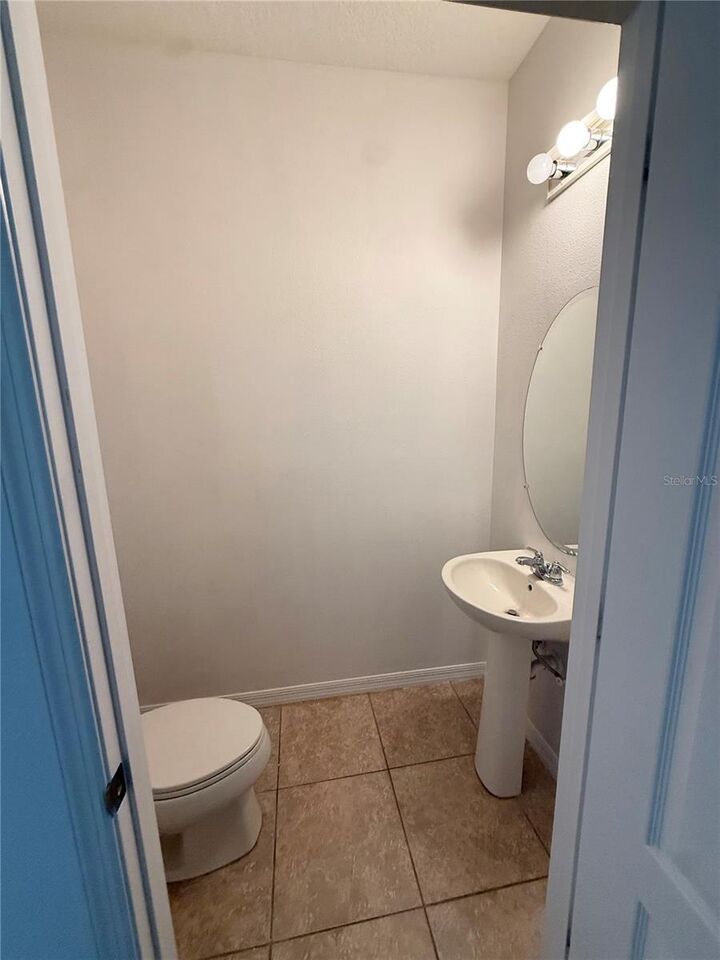 Property Photo: 7605 Ripplepointe Way FL 34786