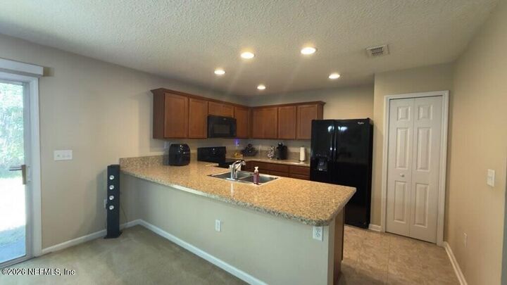 Property Photo:  11850 Alexandra Drive  FL 32218 