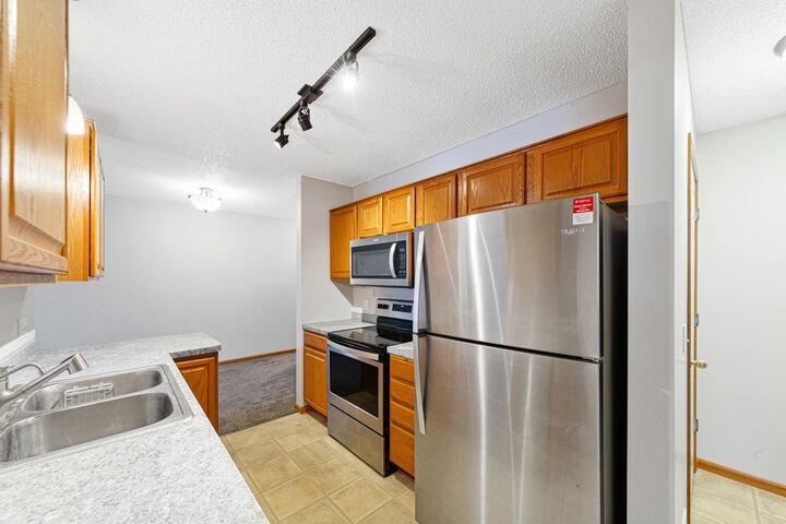 Property Photo:  2718 Brockman Court 714  MN 55057 