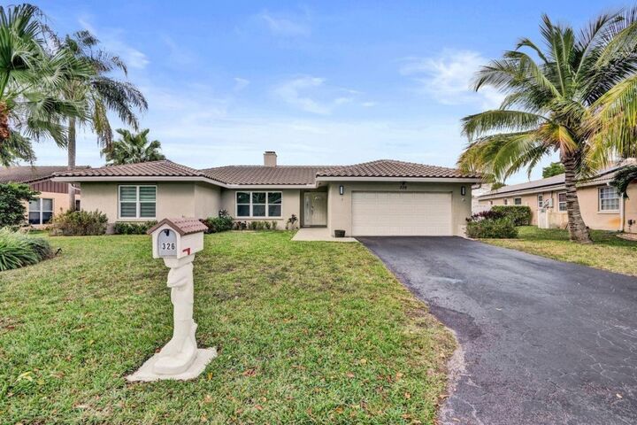 Property Photo: 326 NW 101st Terrace FL 33071