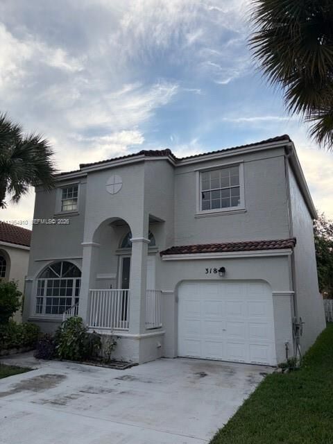 Property Photo:  318 NW 153rd Ave  FL 33028 