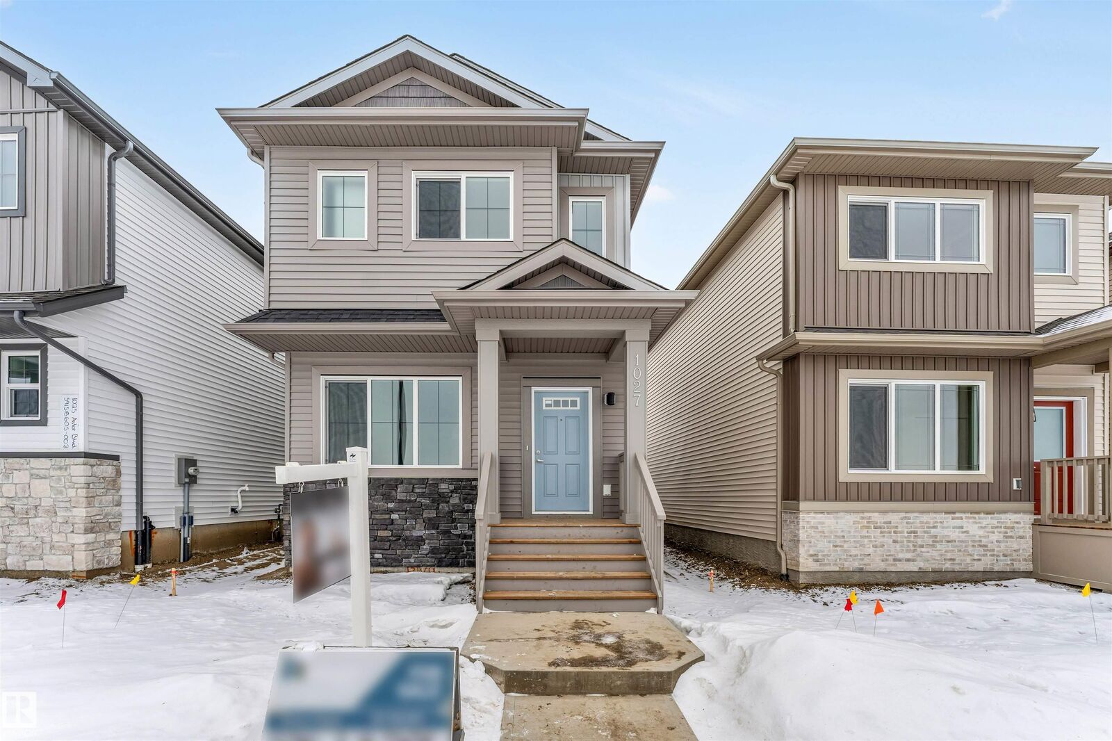 Property Photo: 1027 Aster Boulevard NW AB T6T 2W7