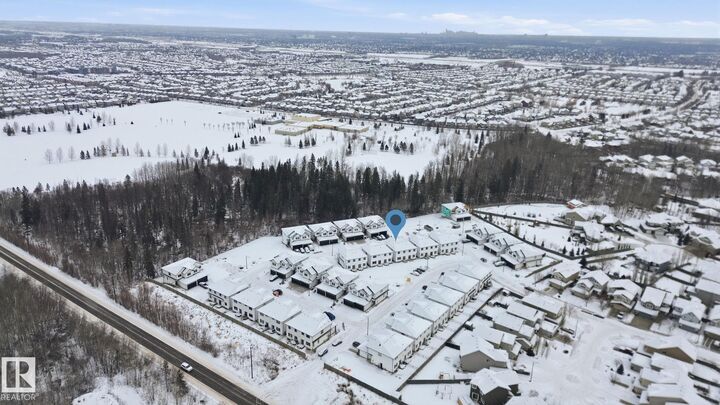 Property Photo:  5122 213A Street NW 64  AB T6M 1M6 