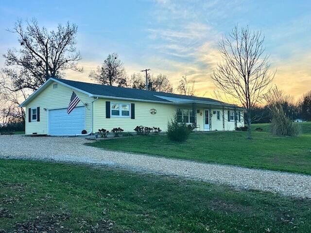 Property Photo:  1404 US-54  MO 65231 