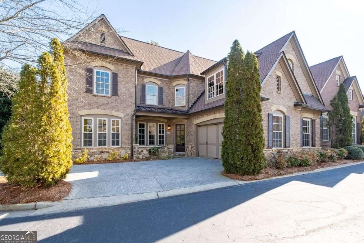 Property Photo:  4650 Woodlawn Gates Lane NE  GA 30068 