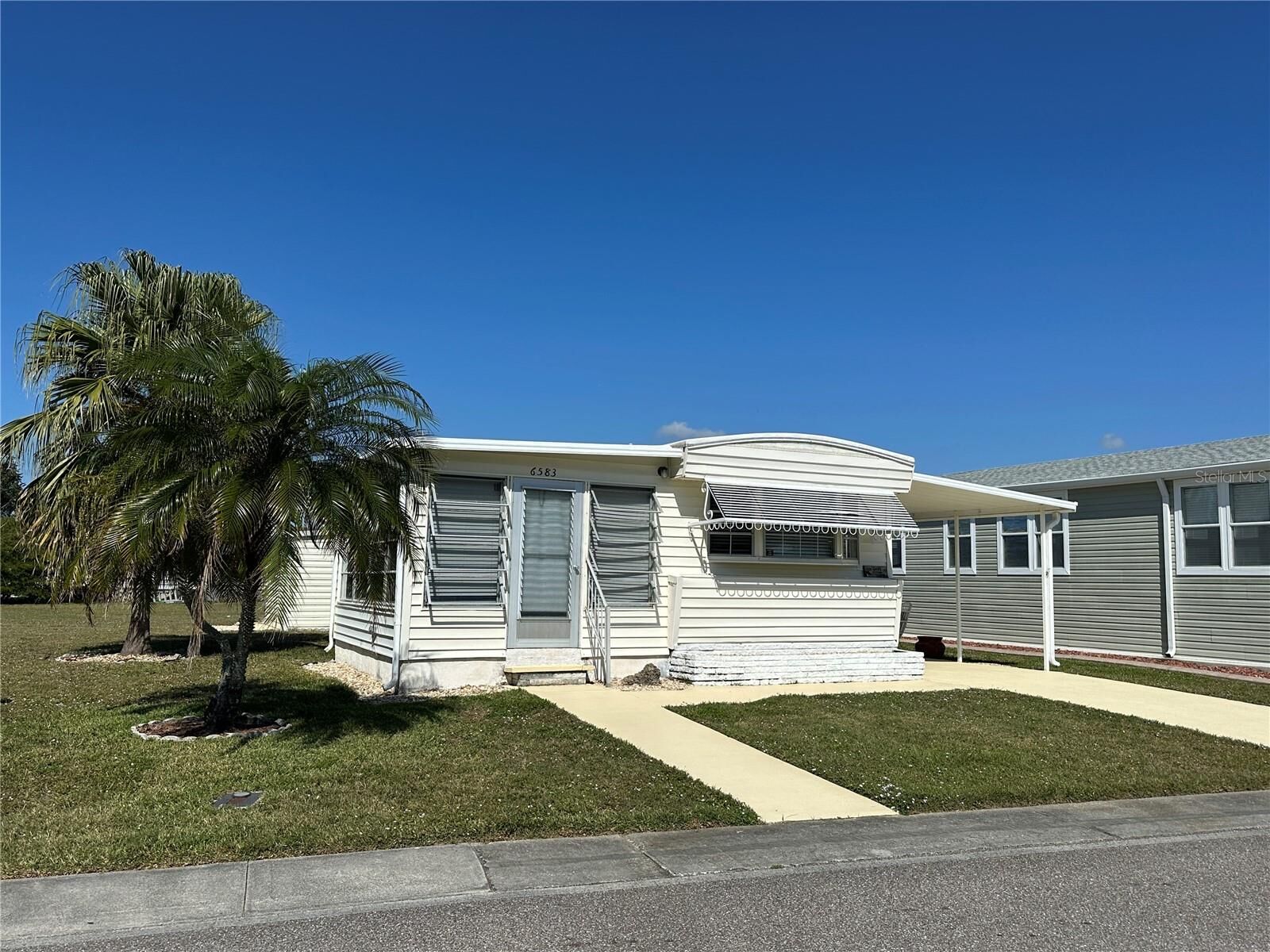 Property Photo:  6583 Hikina Drive  FL 34287 