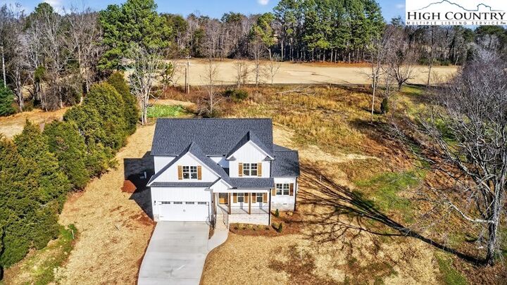 Property Photo:  303 Country Club Drive  NC 27048 