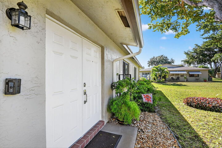 Property Photo:  1544 Palmland Drive  FL 33436 